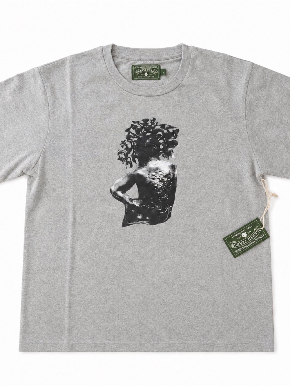 Denim Tears Men’s Gray Short Sleeve Graphic Tee with Black Art Motif
